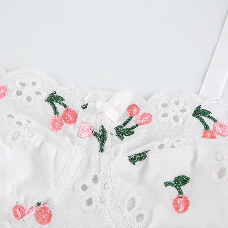 Top de tirantes con bordado floral y aros