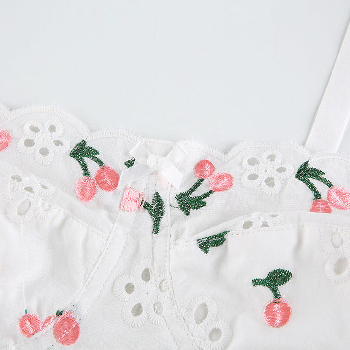 Top de tirantes con bordado floral y aros