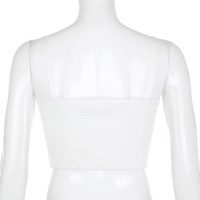 Top de tirantes con bordado floral y aros